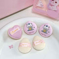 5 pieces of baby pink mini beauty blender on a white plate 