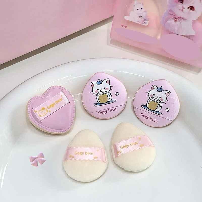 5 pieces of baby pink mini beauty blender on a white plate 