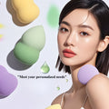 beauty blender of 3 colors beauty korean lady holding by the shoulder 