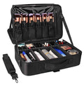 Black makeup case with brushes and cosmetic items on a white background