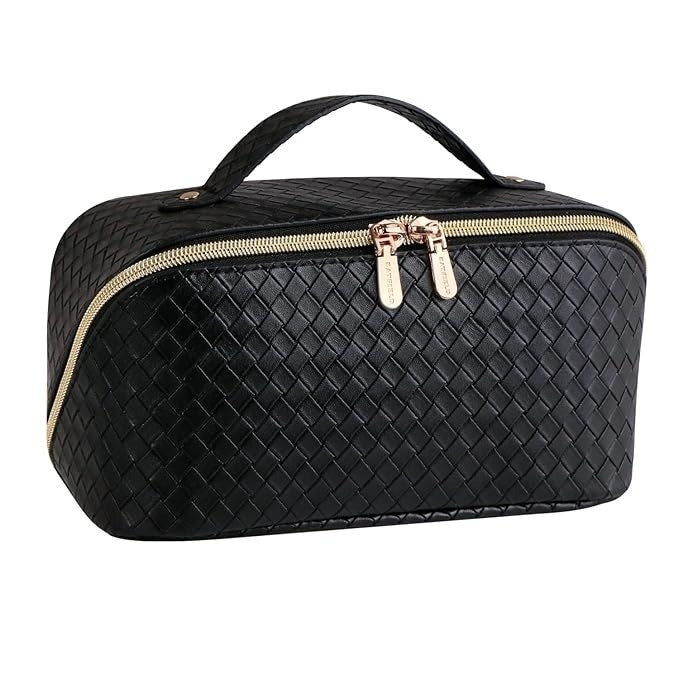 Black woven cosmetic bag with gold zipper on a white background
