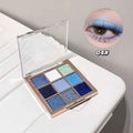 blue glitter eyeshadow palette on a white table  and an eyeshadow pigmentation and fine glitter 
