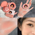 Makeup blush with cartoon character packaging, applied on skin, and close-up of eye.