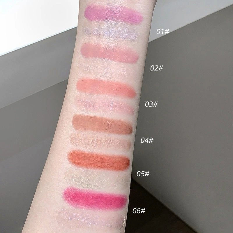 blush swatches on a person's arm with color labels.