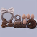 brown beauty blender set of 20 pieces kit on a grey background 