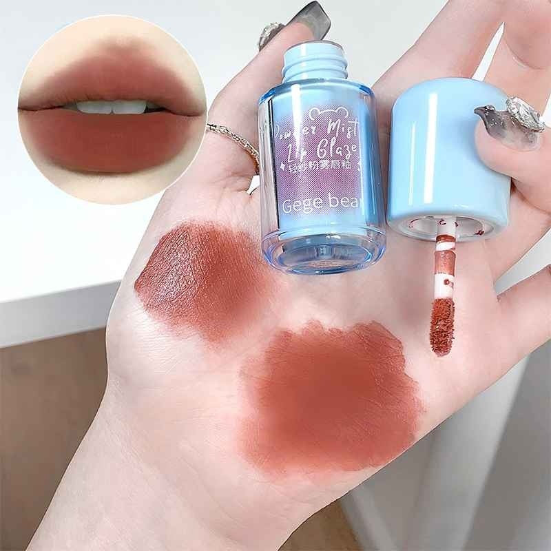 Lip gloss with swatches on a hand and close-up of lips