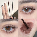 brown mascara applied on the hand and eyelashes 