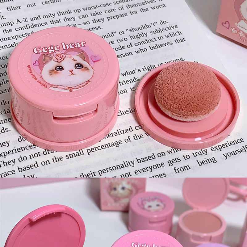 brown peach makeup blush with a cat design on a newspaper background