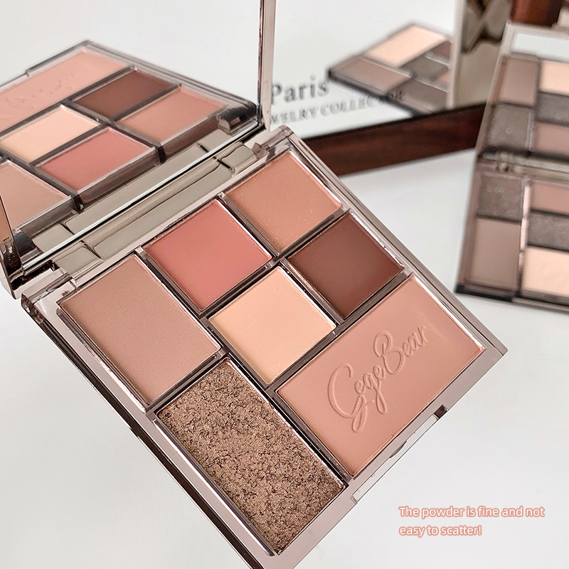 7 color eyeshadow palette showing details of matte colors and one shimmer cake gege bear printed on the one of the color 