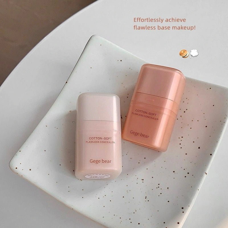 Two Gege bear concealer bottles on a speckled ceramic plate with text about achieving flawless base makeup.