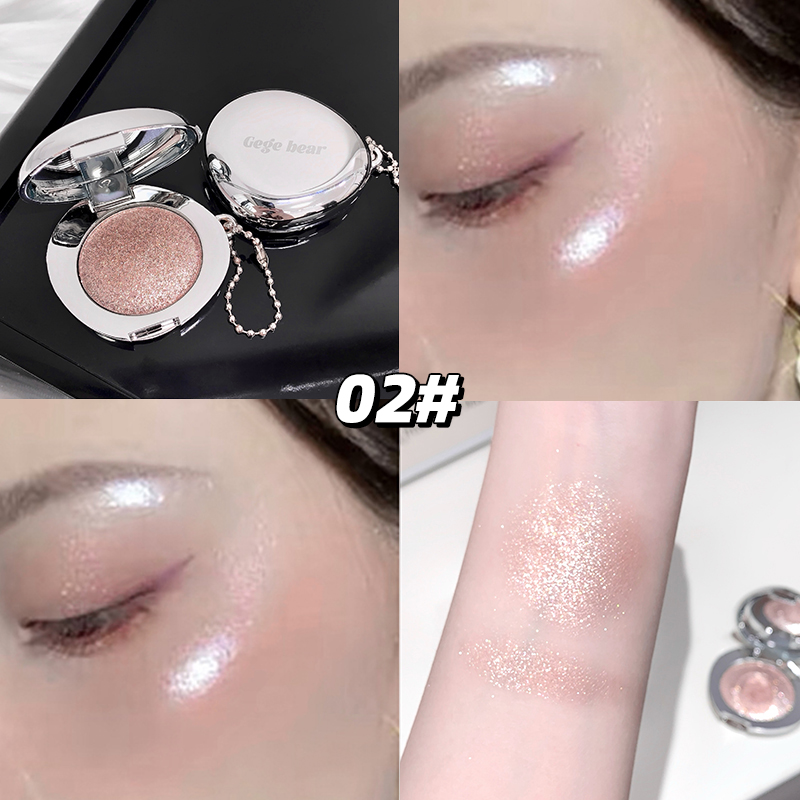 Makeup blush with glittery eyeshadow, applied on eyelids and arm.