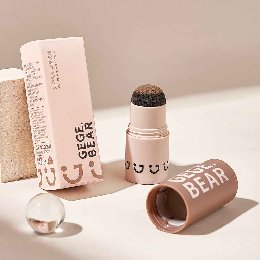 hair stick with smiley face design and packaging on a neutral background