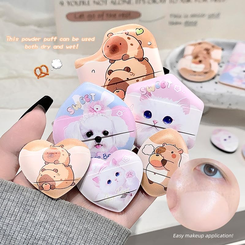cute mini beauty blender of random shapes held by a girl on a hand 