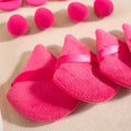 dark pink pizza puffs and mini makeup blender on a grey background 