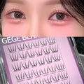 False eyelashes displayed on a tray with a close-up of eyes wearing them.