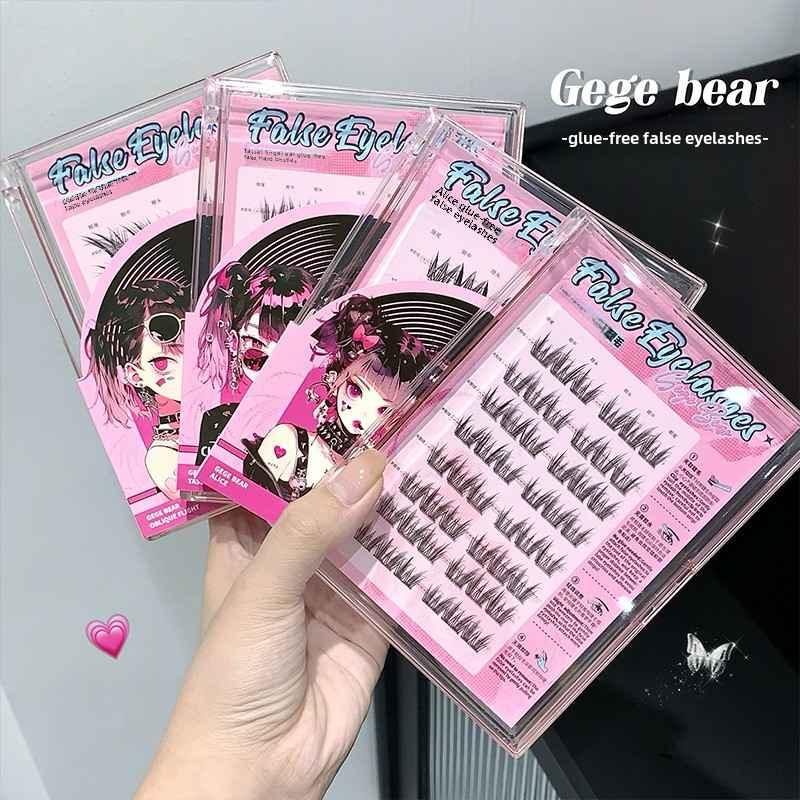 False eyelashes packaging with a hand holding one of the boxes, brand 'Gege bear' visible.