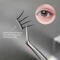Eyelash extension on a tweezers with close-up of eye and text on gray background
