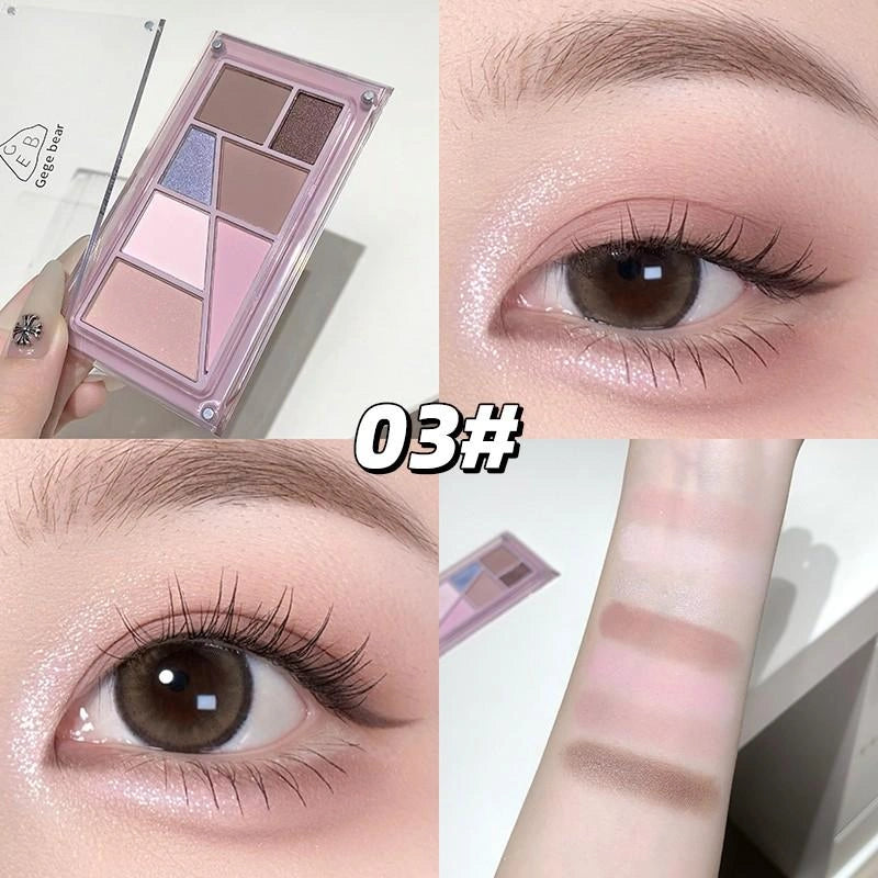 Makeup palette with eye makeup application on a white background