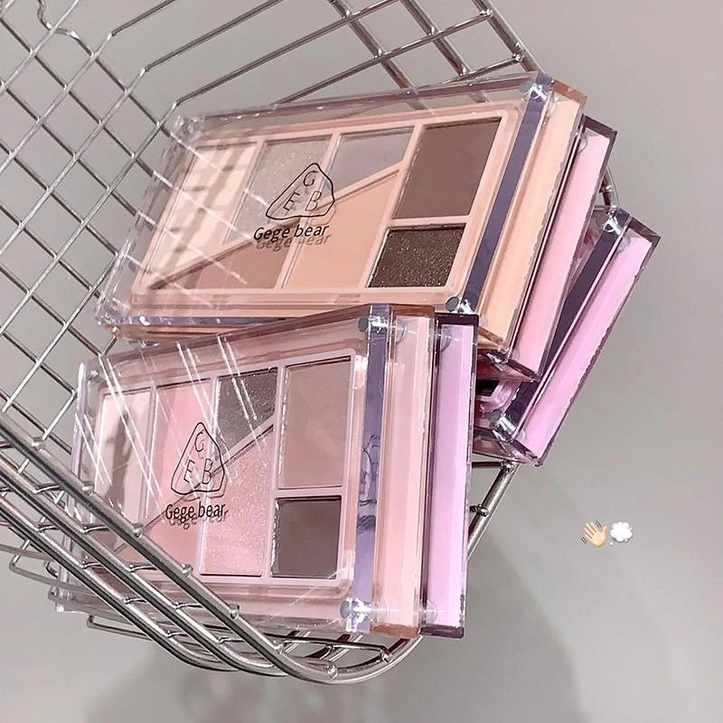 bunch of eyeshadow palette on a metal card, gege bear brand printed on the top of the case front