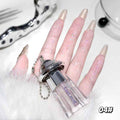 hand holding liquid shimmer eyeshadow finger cleary showing the shimmer and pigmenation on a white background 