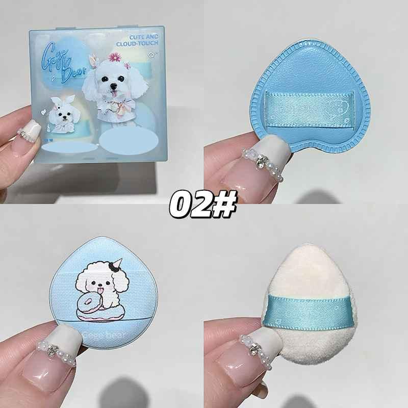 Set of beauty blender with cartoon dog design on a white background branding text gege bear 