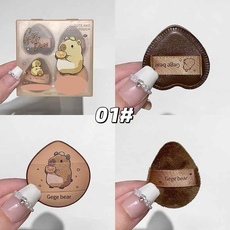Collage of a small brown heart-shaped product with 'Gege bear' branding, held by a hand.