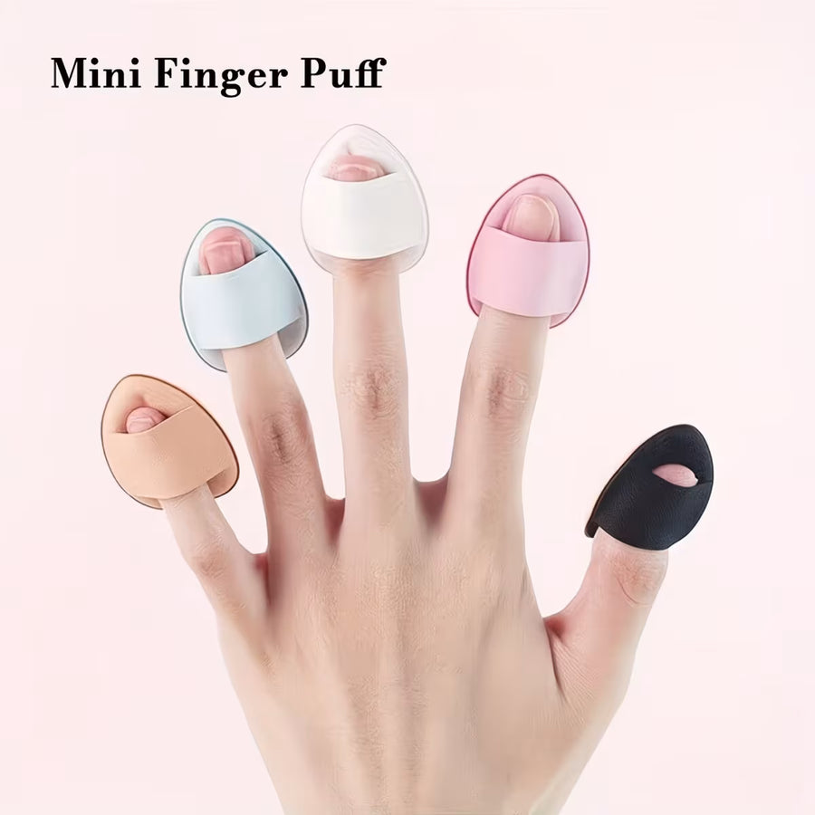 Hand with mini finger puffs in various colors on a white background