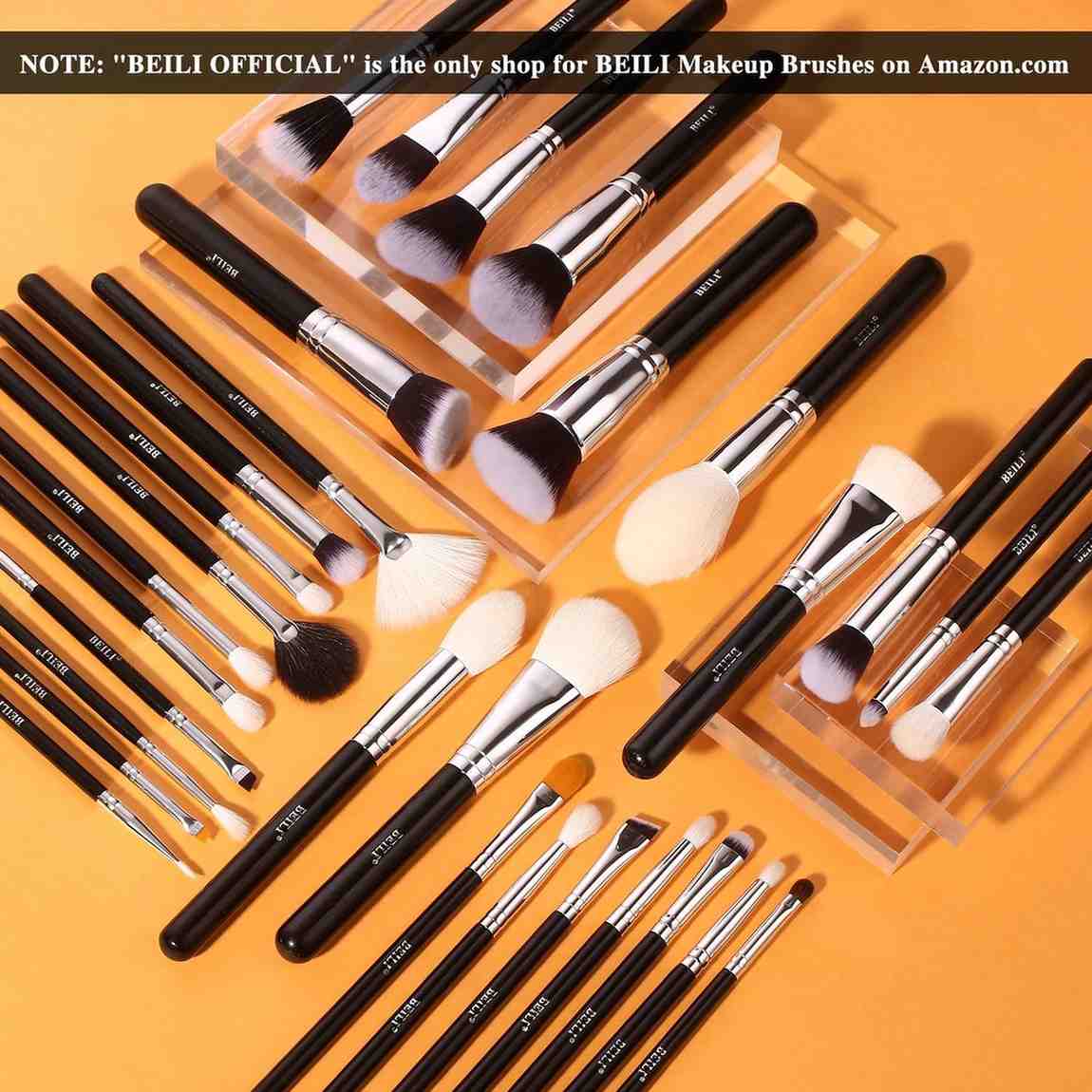 Collection of BEILI makeup brushes on an orange background