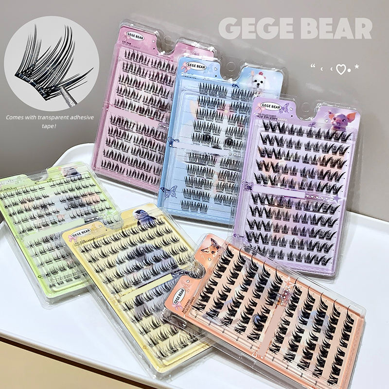 Collection of false eyelashes in various packaging on a white surface with 'GEGE BEAR' branding.