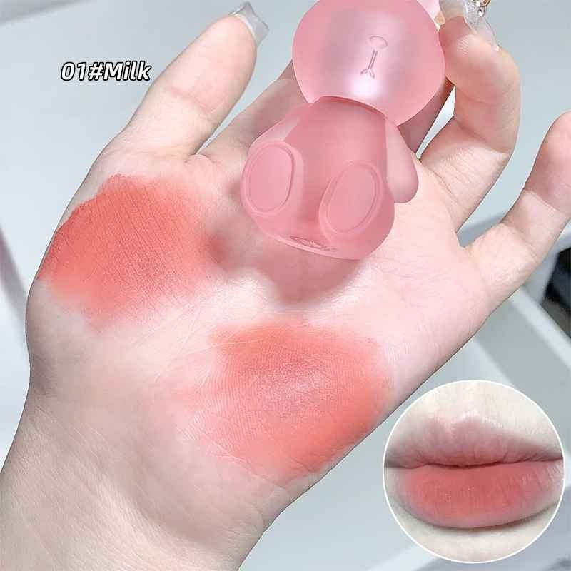 gege bear bunny keychain lipstick light pink pigmentation shown on the palm and lips 