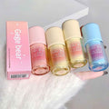 Set of Gege bear lip glosses with packaging on a white background