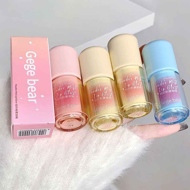 Set of Gege bear lip glosses with packaging on a white background