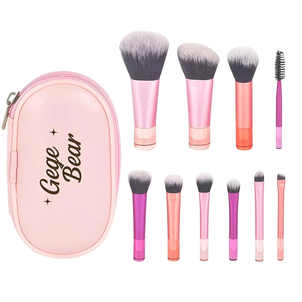 Makeup brush set with pink and rose gold handles and a pink case labeled 'Gege Bear' on a white background.