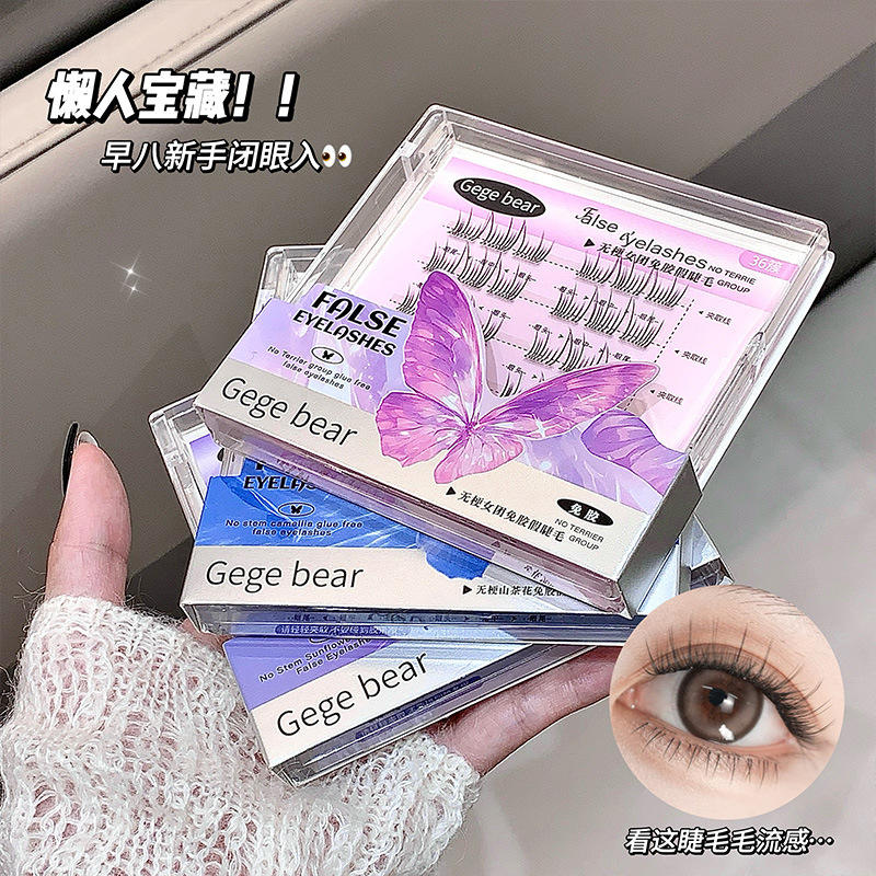 False eyelashes packaging with butterfly design held by a hand, close-up of an eye wearing the lashes.
