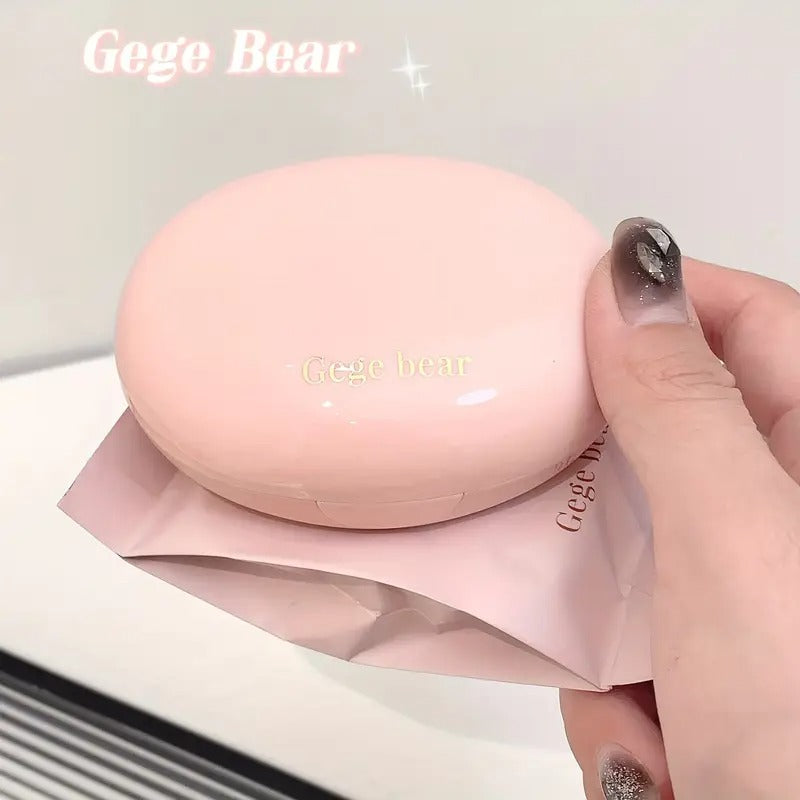 pink packaing box of gege bear matte foundation held on the hand 