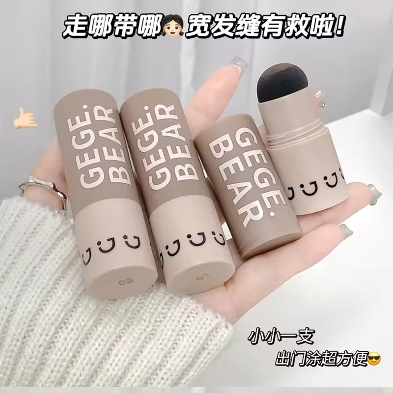 Four 'GEGE BEAR' grey hair remover stamper held in a hand with a white background.