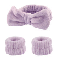purple headband and wristbands on the white background 