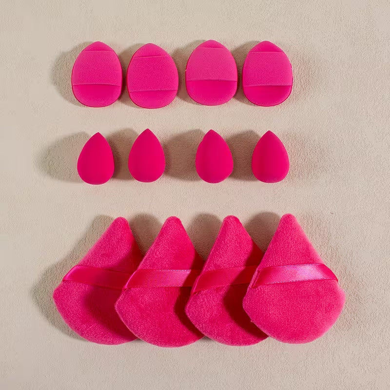 hot pink finger beauty blender, mini beauty blender and powder puff in triangular shape 