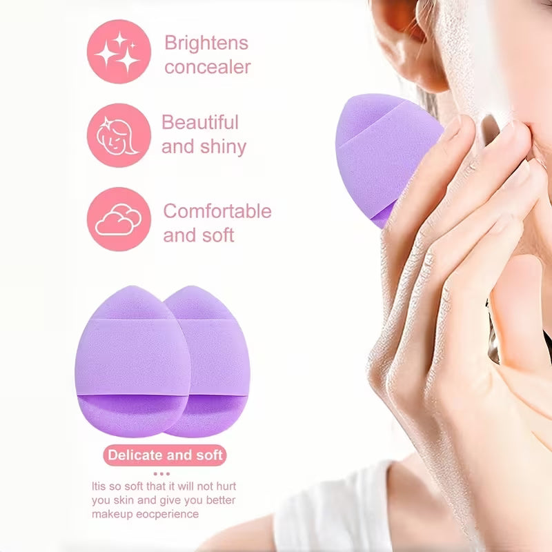 information on finger makeup beauty blender indicating softness a girl holding it between the fingers 