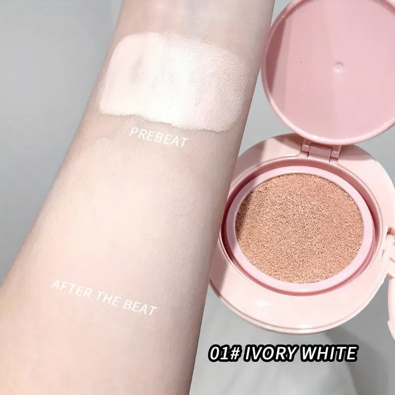 Makeup foundation with 'Ivory White' shade on a gray background tested on a hand of model 