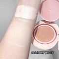 Makeup foundation with 'Ivory White' shade on a gray background tested on a hand of model 