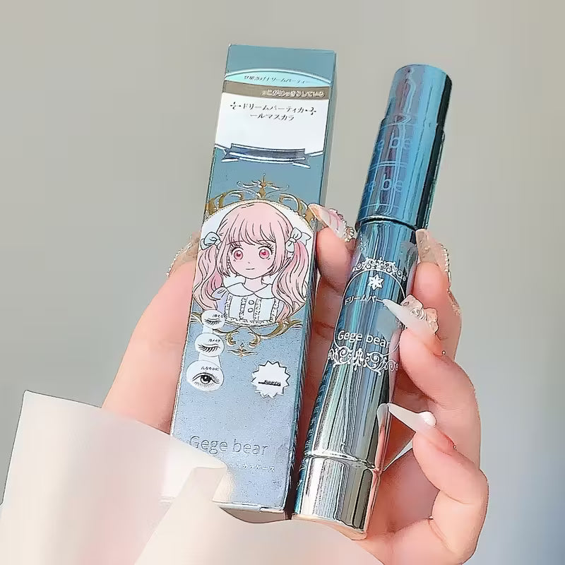 black mascara with an illustrated box featuring a character.