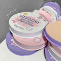 Gege Bear compact  in a hand with close-up inset showing color on skin