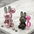 bunny design gege bear lipgloss and lipstick on a marble background 