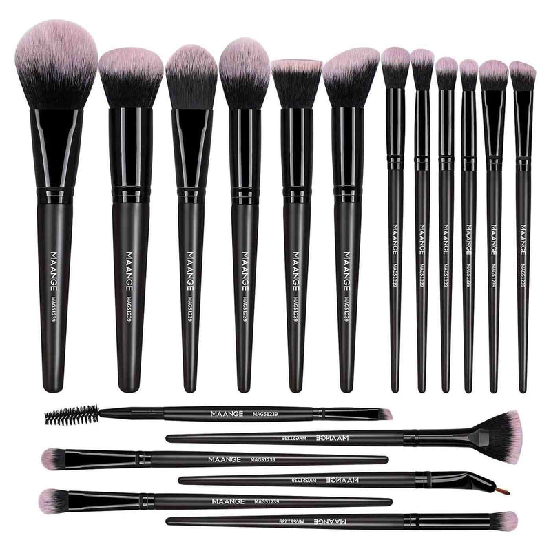 Set of makeup brushes with black handles and pink bristles on a white background