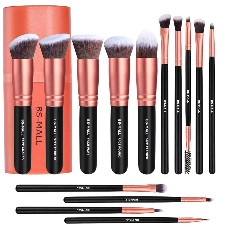Set of makeup brushes with rose gold and black handles, including a cylindrical packaging container, on a white background.