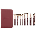 Set of makeup brushes with a Mars-branded case on a white background