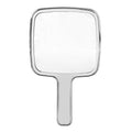 Handheld mirror with a clear reflective surface on a white background