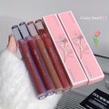 Set of lipstick with their packaging on a neutral background