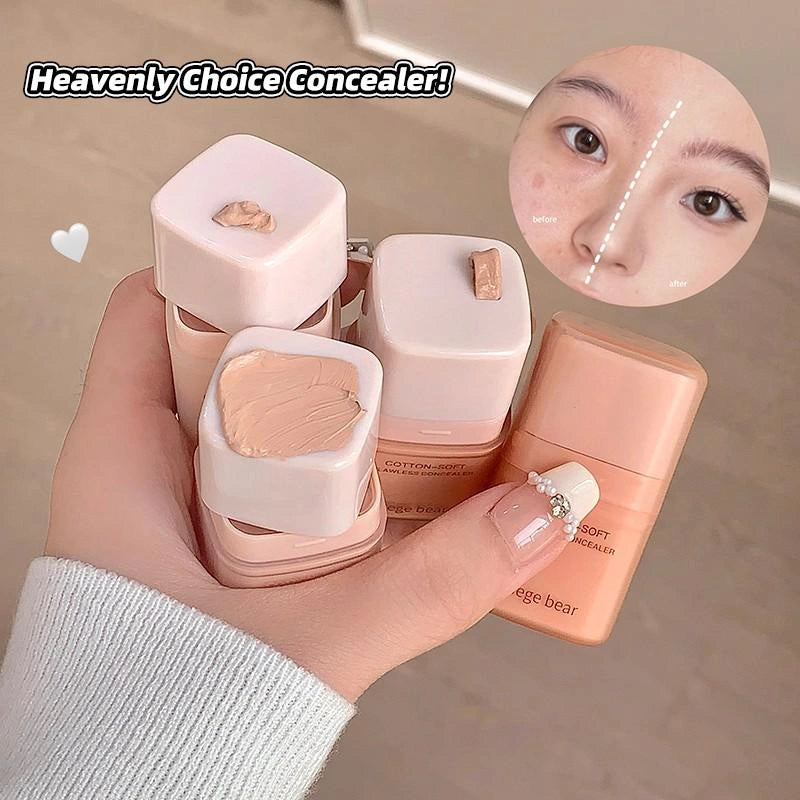 Hand holding gege bear matte and waterproof concealer with close-up of concealer application on skin.